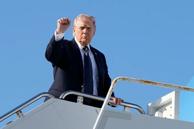 Reuters image of President Donald Trump pumping his fist.