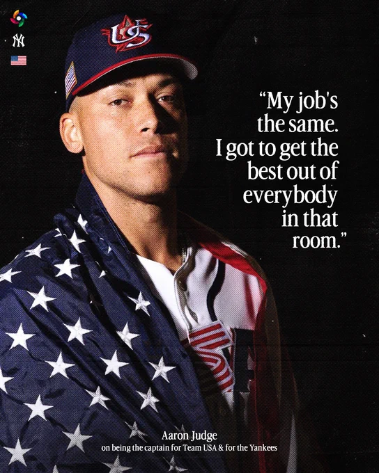 "My job's the same. I got to get the best out of everybody in that room." - Aaron Judge on being the captain for Team USA & for the Yankees

Aaron Judge in his WBC Team USA uniform with an American flag draped on his shoulders.