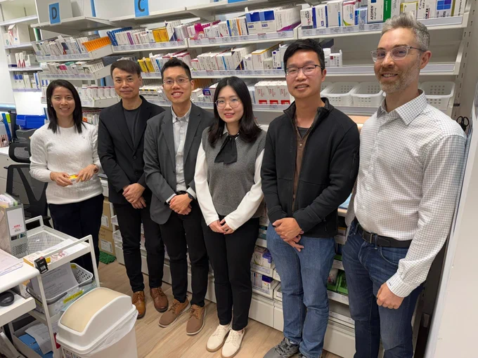 Professor Eric Wan Yuk-fai (third left) with the research team