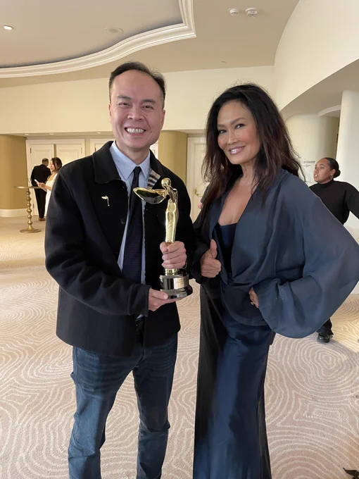 AMD SVP & GM Jack Huynh accepting the Advanced Imaging Society Lumiere Award on behalf of @AMD, alongside Tia Carrere, actress and 2-time Grammy Award-winning artist from Wayne’s World.