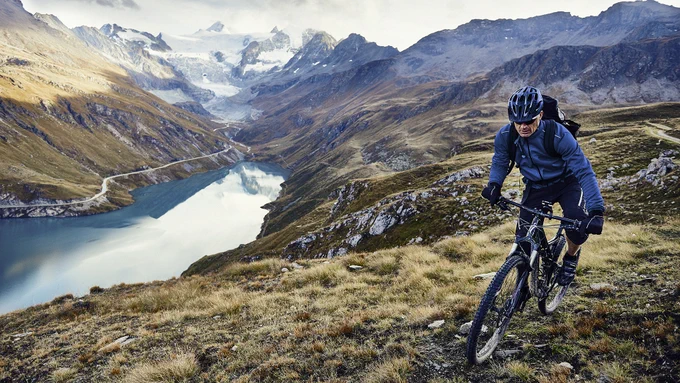 Man on mountainbike on a mountain view. 