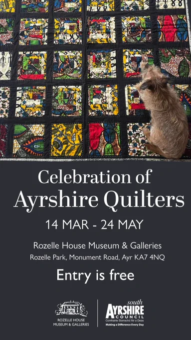 Exhibition poster featuring an intricately designed quilt. A dog lies on the bottom right corner.

Poster text reads:
Celebration of Ayrshire Quilters
14 Mar - 24 May
Rozelle House Museum & Galleries
Rozelle Park, Monument Road, Ayr, KA7 4NQ
Entry is free