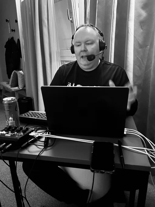 Steven broadcasting from his hotel room