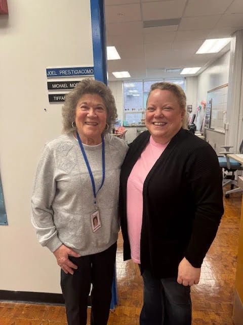 image of teacher and board member