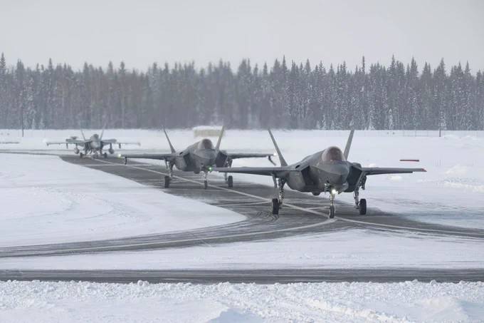 Two United States Air Force (USAF) Lockheed Martin F-35 Lightning II aircraft and one Royal Canadian Air Force (RCAF) CF-188 Hornet taxi on the tarmac during Exercise Arctic Edge 26 at Eielson Air Force Base, Alaska.

Photo by Sgt Steeve Picard, February 25, 2026, Eleison AFB, Alaska

 