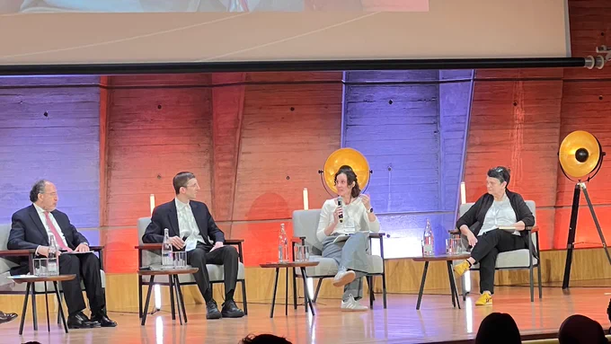 panelists on stage