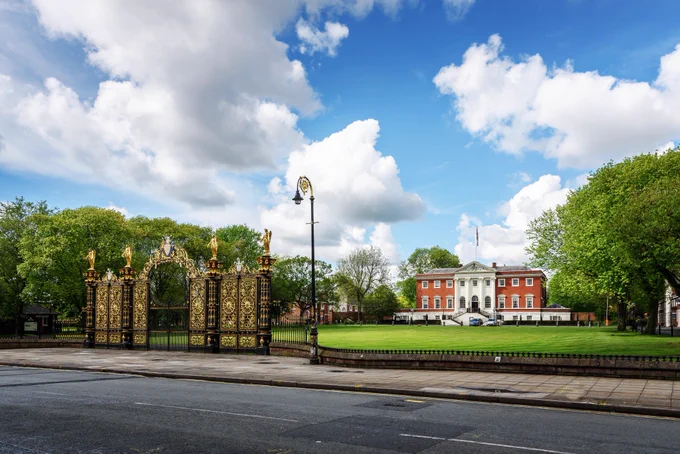 Image of Warrington Town Hall and the golden gates.