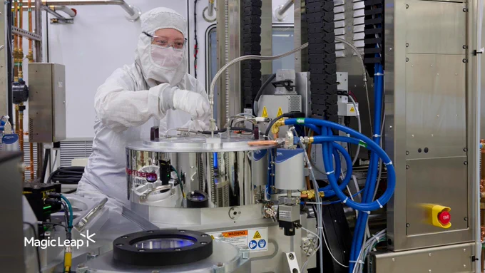  A Magic Leap technician makes an adjustment to a machine to prepare for the single-step wafer etching process.
