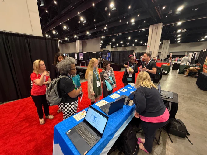 Christie Cloud and Dave Hinrichs sharing about Markify at the Markify booth at NCTIES.