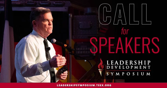 man speaking on stage