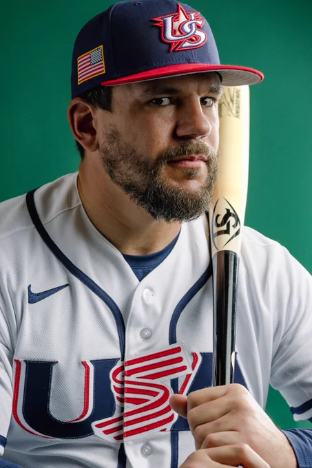 Posed photo of Kyle Schwarber wearing a Team USA World Baseball Classic uniform