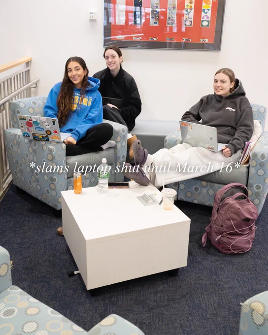 Three students taking a photo together with "*slams laptop shut until March 16*" as text on the image. 