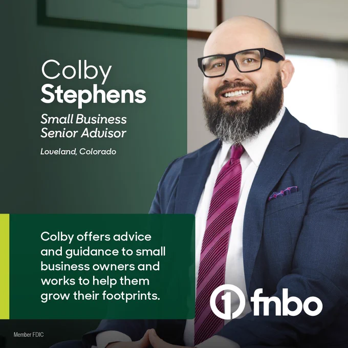 A person with glasses and a beard, dressed in a suit and tie, is seated and smiling. Text on the image reads: "Colby Stephens, Small Business Senior Advisor, Loveland, Colorado. Colby offers advice and guidance to small business owners and works to help them grow their footprints." The FNBO logo is visible.