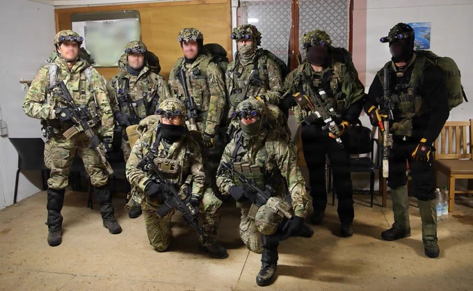 Green Berets with 2nd Battalion,10th Special Forces Group (Airborne), U.S. Special Operations Command Europe, pose for a photo before Exercise Deep Strike at the Joint Multinational Readiness Center near Hohenfels, Germany, Feb. 22, 2026. SOCEUR conducted the first iteration of special operations deep strike lanes, a pivotal training initiative designed to enhance force readiness by operating in geographically dynamic and complex scenarios, including denied environments with contested electronic warfare spaces. (U.S. Army National Guard photo by Sgt. Glenn Brennan)
