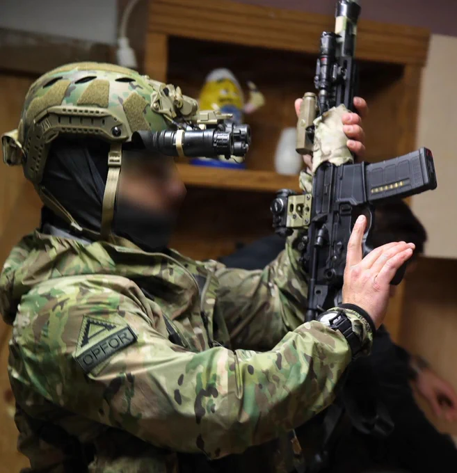 A Green Beret with 2nd Battalion,10th Special Forces Group (Airborne), U.S. Special Operations Command Europe, prepares his weapon for Exercise Deep Strike at the Joint Multinational Readiness Center near Hohenfels, Germany, Feb. 16, 2026. SOCEUR conducted the first iteration of special operations deep strike lanes, a pivotal training initiative designed to enhance force readiness by operating in geographically dynamic and complex scenarios, including denied environments with contested electronic warfare spaces. (U.S. Army National Guard photo by Sgt. Glenn Brennan)