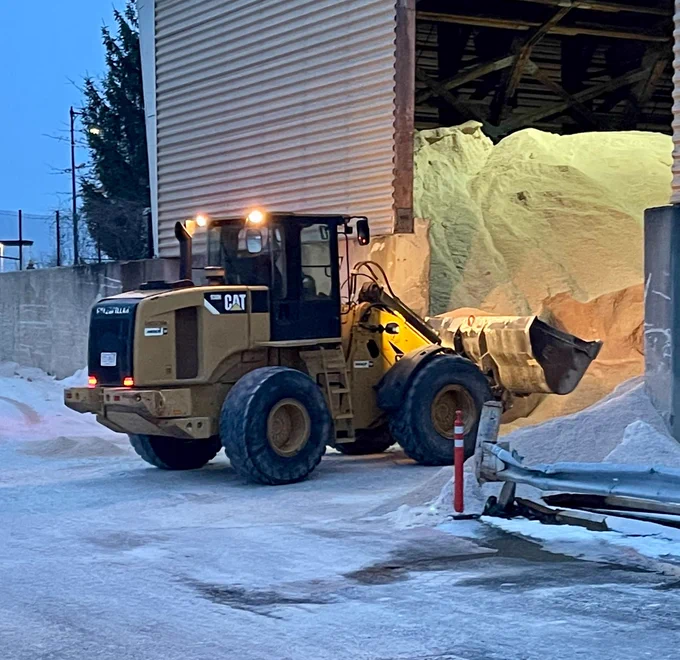 Picture: PWD crews and contractors loading up with salt to treat roadways.