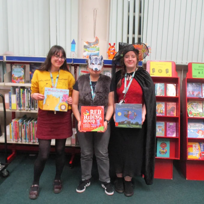 Staff at Rawtenstall Library dressed as the 'room on the broom' witch, the big bad wolf and Winnie the Pooh for World Book day 2026!