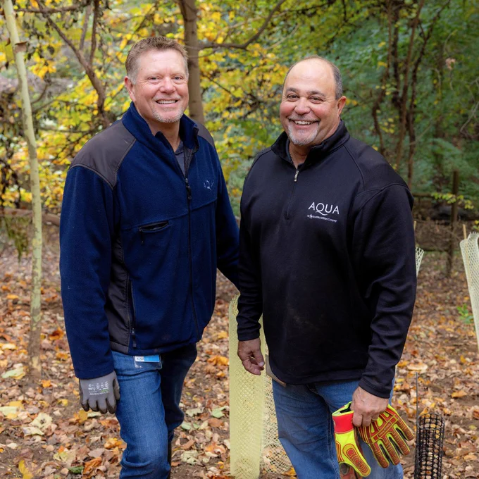 Our Aqua team participating in a tree planting volunteer event.