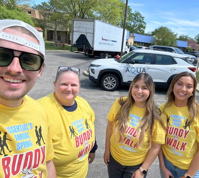 Members of our Aqua team participating in our Spring Buddy Walk.