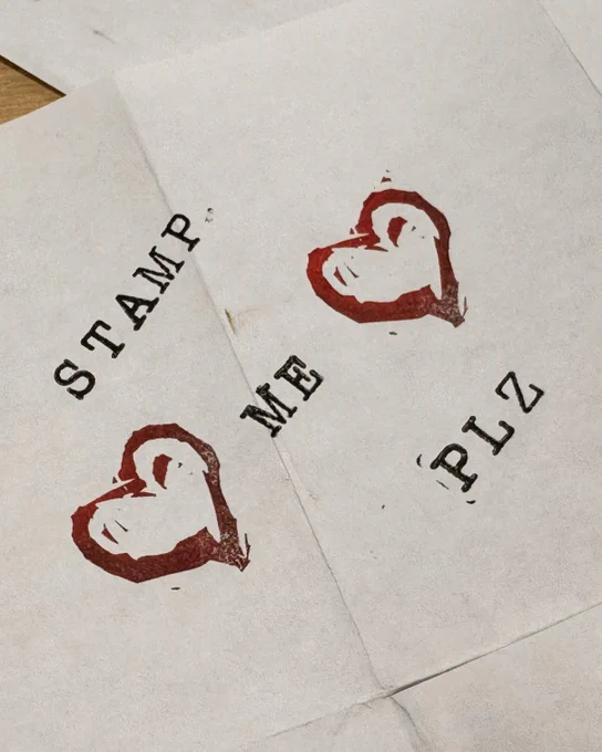 Close-up of hand-carved stamps and ink impressions