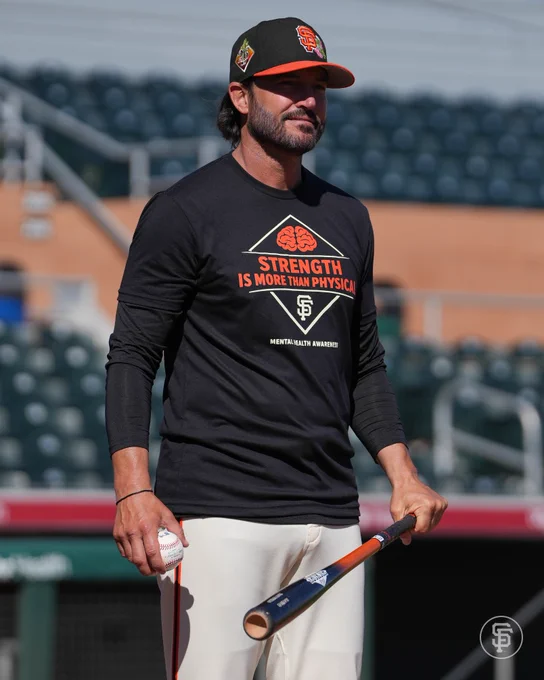 Vitello in a "Strength is More Than Physical" Shirt