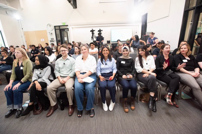 Image Description: 2025 Grad Slam audience smiling.