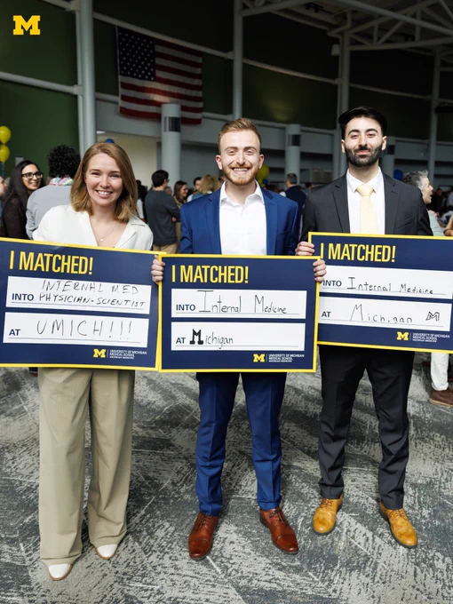 Three U-M Medical School students each holding signs that say they matched into internal medicine at Michigan.
