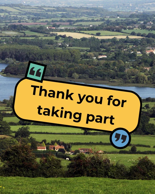 an ariel photo of a lake and the surrounding countryside with a yellow sticker overlay that says 'Thank you for taking part'.