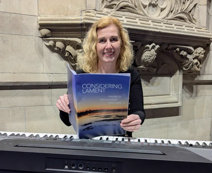 Rev Dr Karen Campbell is pictured in the Assembly Hall of the Presbyterian Church in Ireland with a copy of ‘Considering Lament: Psalms of protest, pain and hope’, a suite of eight psalms and accompanying liturgies, has been written and composed by Dr Campbell and her husband David. It will be launched in Assembly Buildings on Thursday, 26 March. All welcome.