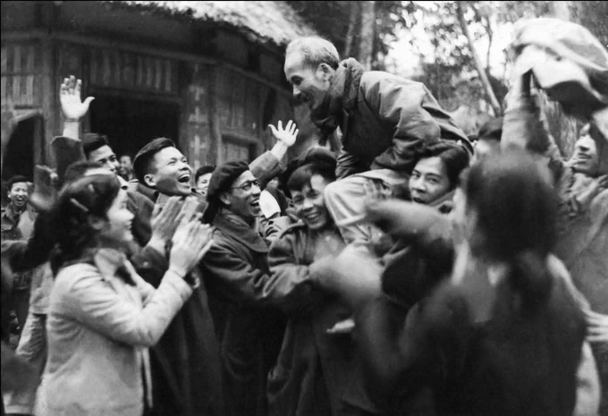 President Hồ Chí Minh cheered by his people, March 1951.