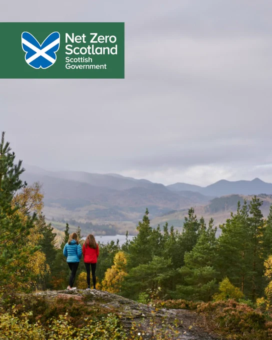 Image of two girls overlooking forest in Scotland.