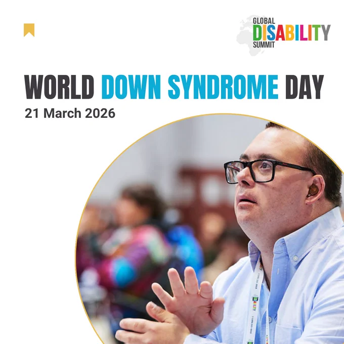 Poster for World Down Syndrome Day on 21 March 2026 by the Global Disability Summit. The design features text with “Down Syndrome”. On the right, a close-up photo shows a person with Down syndrome, gesturing with his hands while looking attentively ahead, with a blurred audience in the background.