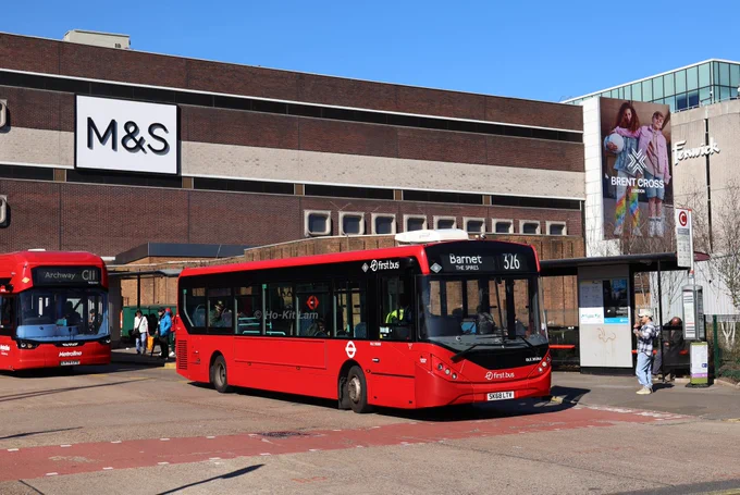 First Bus London DLE30260 (SK68LTV) is a red Alexander Dennis Enviro200MMC and is pictured at Brent Cross Shopping Centre as it heads to Barnet, The Spires on route 326.