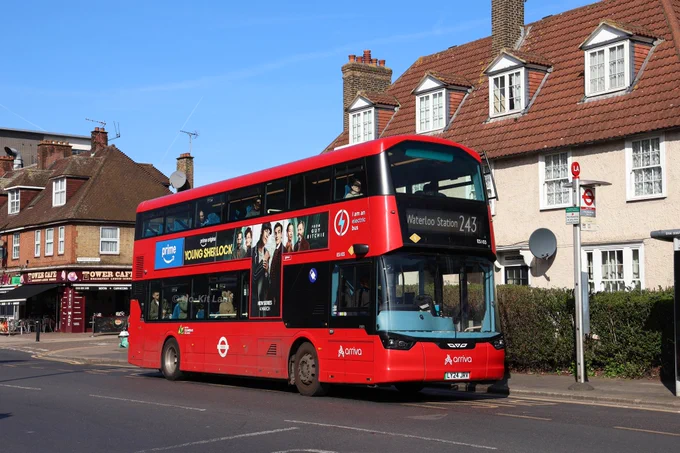 Arriva London ES103 (LY24JRV) is a red Wright Streetdeck Electro liner and is pictured at The Roundway as it heads to Waterloo Station on route 243.