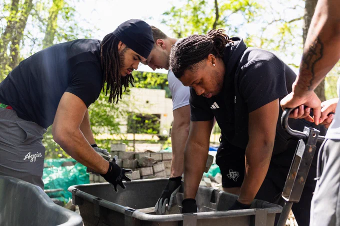 Jeremiah Searcy (Left) & Ramarion Tillman (Right) volunteer at The Big Event in the Bryan-College Station community. 