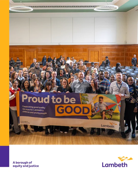 A group of people holding up a banner saying ' proud to be good'