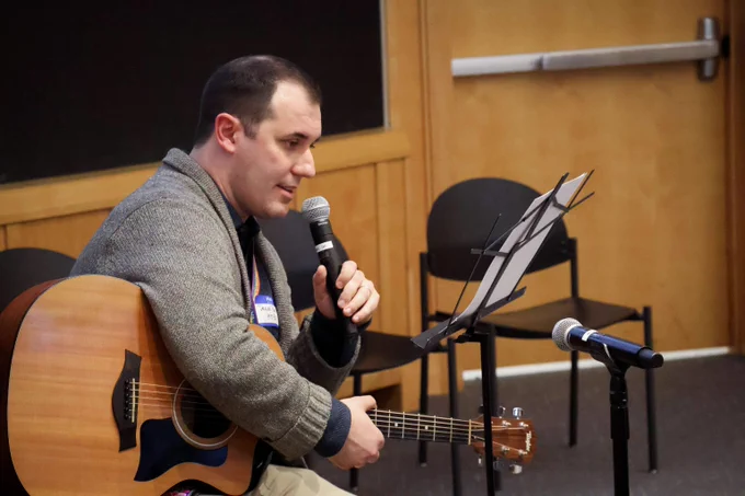 Person playing guitar