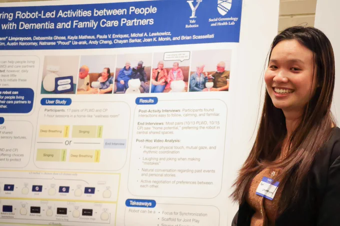 Person presenting poster