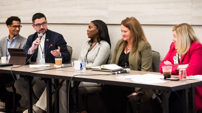 photo of a PIE Network panel of five individuals smiling in conversation at PIE Network Executives' Meeting