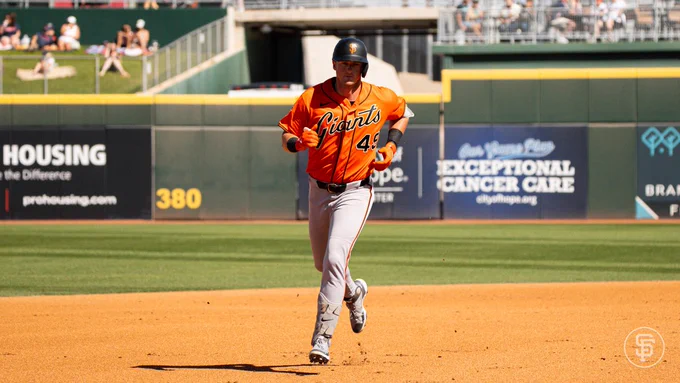 Tyler Fitzgerald rounds the bases after his 2-run HR