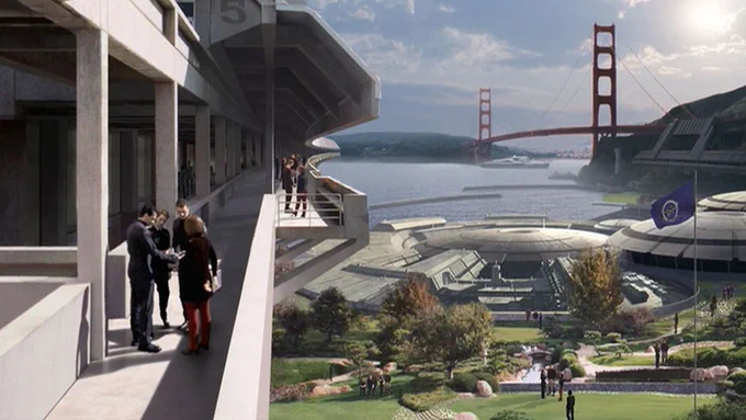 The sprawling complex was originally built as the headquarters of the United Earth Starfleet in the early 22nd century, on what was previously a portion of Golden Gate National Recreation Area in Marin County, overlooking Horseshoe Bay. After the founding of the United Federation of Planets in 2161, it continued to serve as the command center of the Federation Starfleet. By 2255, the headquarters had expanded to the Presidio, a former military post on the southern side of the Golden Gate, where it included an air tram station. Its address at 24-593 Federation Drive, San Francisco, CA was mentioned in the Treaty of Armens. 
