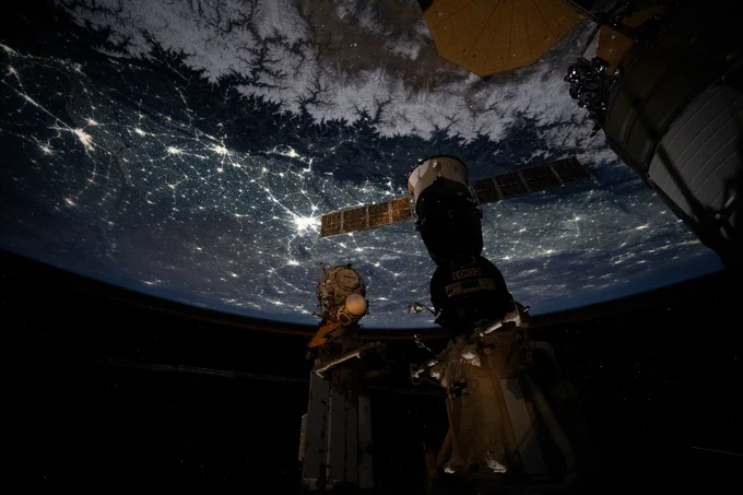 iss074e0351753 (March 6, 2026) --- The snow‑capped Himalayas form a natural boundary between Asia and the well‑lit nighttime cityscape of the Indian subcontinent. At center is Delhi, the capital territory of India, with a metropolitan population of about 33.8 million. The International Space Station was orbiting 264 miles above southwestern China at approximately 11:22 p.m. local time when this photograph was taken. Credit: NASA/Chris Williams