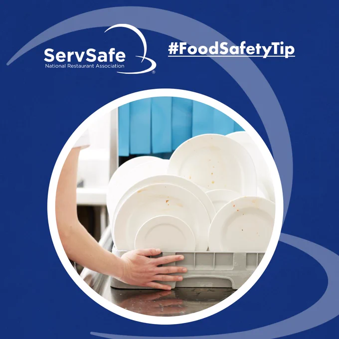 A person placing a rack of dirty plates into a dishwasher. The image features the ServSafe National Restaurant Association logo and the hashtag #FoodSafetyTip.