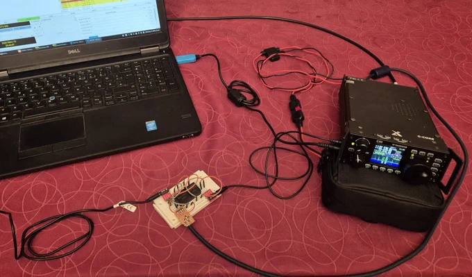 My digimode setup. The G90 rests on the Eremit battery and is connected to the PC via its USB CAT cable (with a snap-on ferrite). The DIY digimode adapter is connected on one side to the G90’s ACC port and headphone jack, and on the other side to the PC’s headset jack.