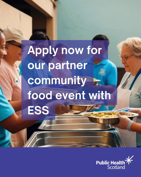 Volunteers serving food to community members at a Public Health Scotland event.