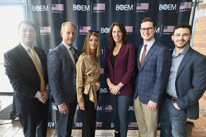 At the Big Beautiful Gulf 2 oil and gas lease sale, a group of Interior and BOEM officials stand in front of a BOEM backdrop. From left to right, the officials include: BOEM Acting Director Matt Giacona, Acting Assistant Secretary for Land and Minerals Management Lanny E. Erdos, BOEM Acting Gulf of America Regional Director Laura Robbins, Deputy Secretary of the Department of the Interior Kate MacGregor, BOEM Senior Advisor Matthew Palmer, and Chief of Staff for the Deputy Secretary Andrew Mott.