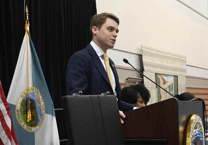 BOEM Acting Director Matt Giacona stands at the podium and gives remarks at the Big Beautiful Gulf 2 oil and gas lease sale.