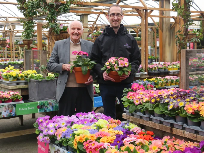 Colin Squire (Chairman Emeritus, Squire’s Garden Centres) and Oliver Turner (General Manager, Barnsfold Liss) survey the colours and varieties of primroses produced by Squire’s West Sussex nurseries.