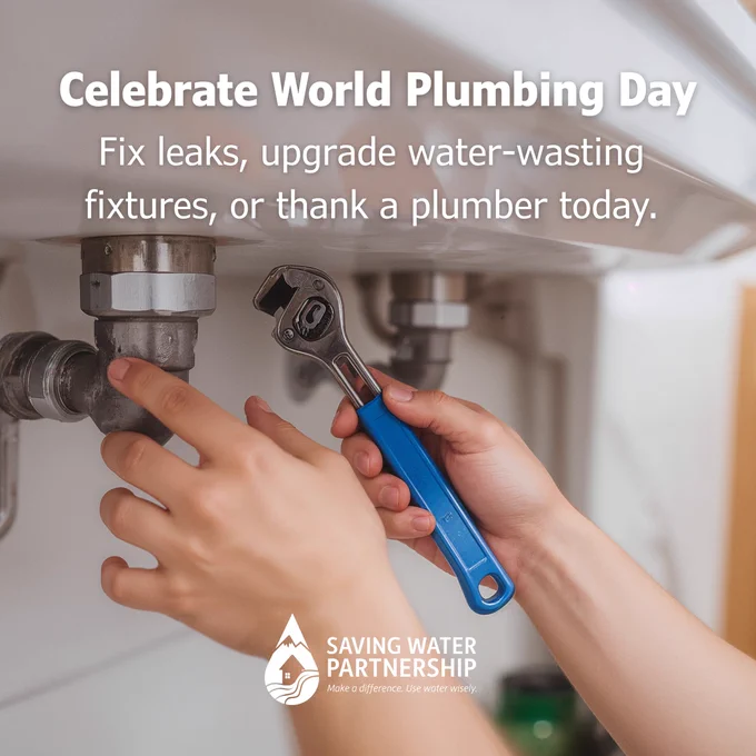 Hands using a wrench to adjust plumbing under a sink. Text reads: "Celebrate World Plumbing Day. Fix leaks, upgrade water-wasting fixtures, or thank a plumber today." Saving Water Partnership logo is visible.
