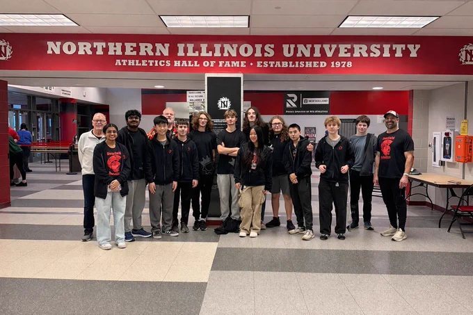 Staff and students posing for a photo